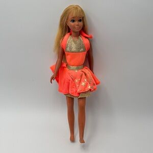 Mattel Doll in Bright Orange and Gold Outfit